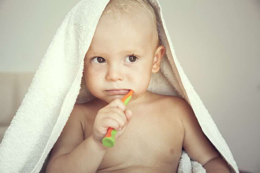 baby brushing teeth